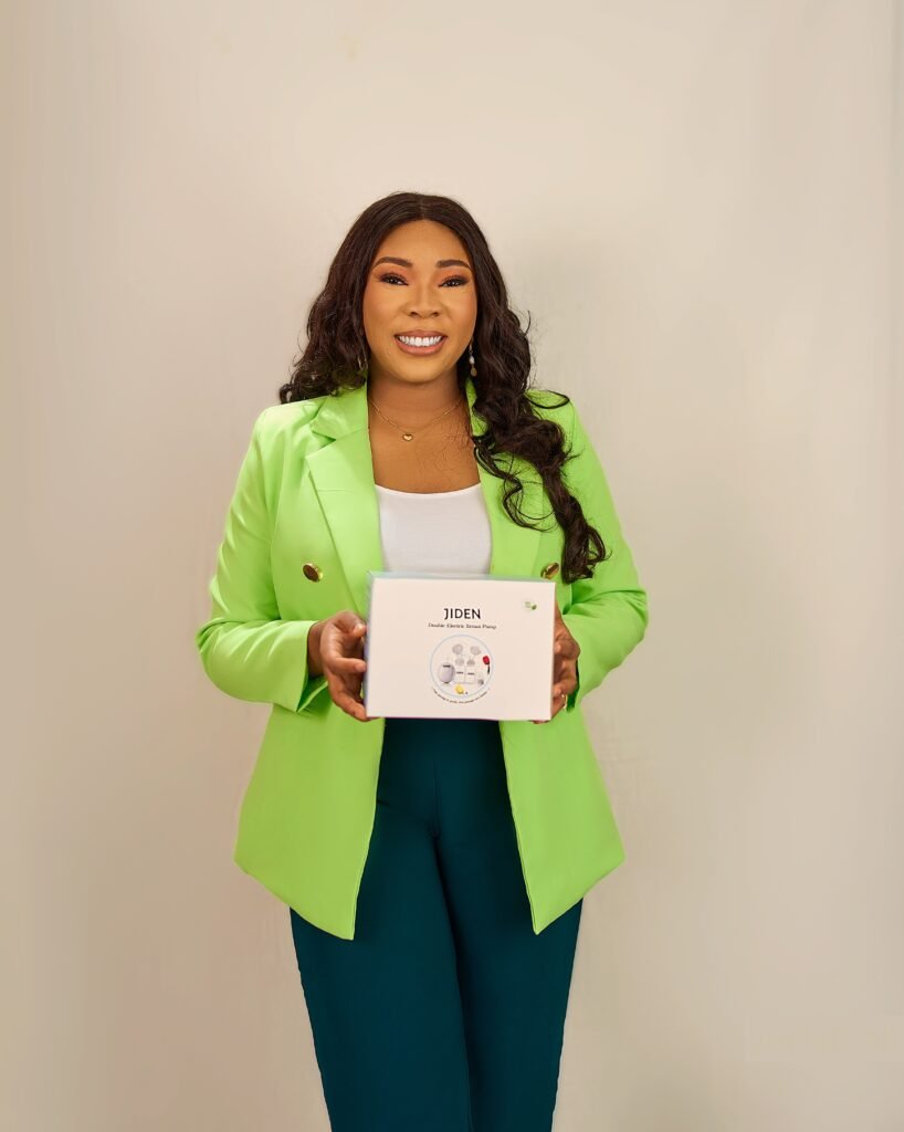 Mrs Mercy Onyinyechi Agbagwa, founder of Jiden and Certified Breastfeeding Specialist, holding a Jiden breastpump